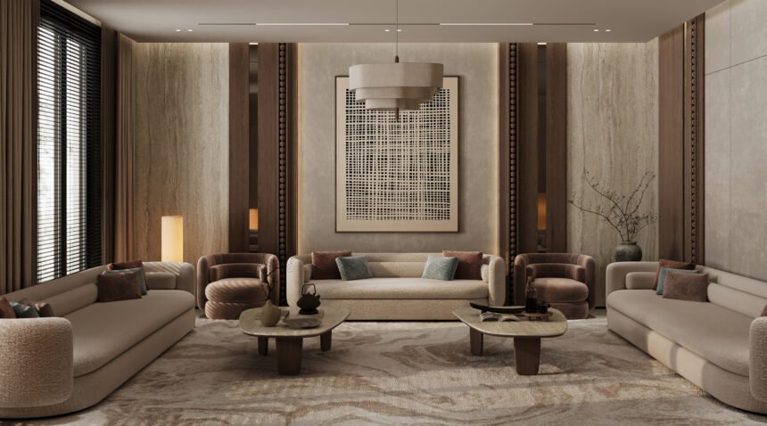 تصميم مجلس رجال فاخر بتصميم جابندي من شركة تيلا المعمارية في الرياض، يتميز بكسوة جدران خشبية داكنة مع إضاءة مخفية وأثاث ترابي مريح.